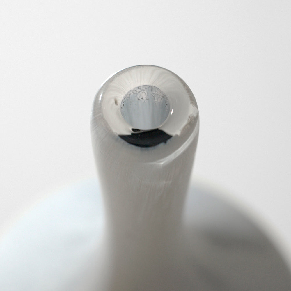 34 white object bottle