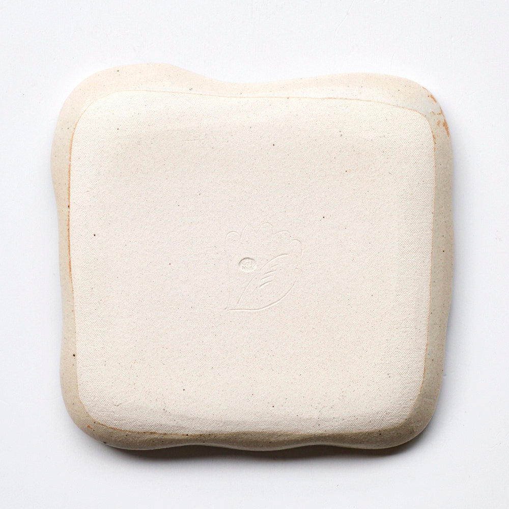 63 黒い花縁取り変形皿（角）